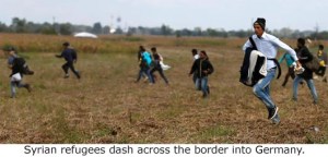 MigrantsDashAcrossBorderToGermany-530